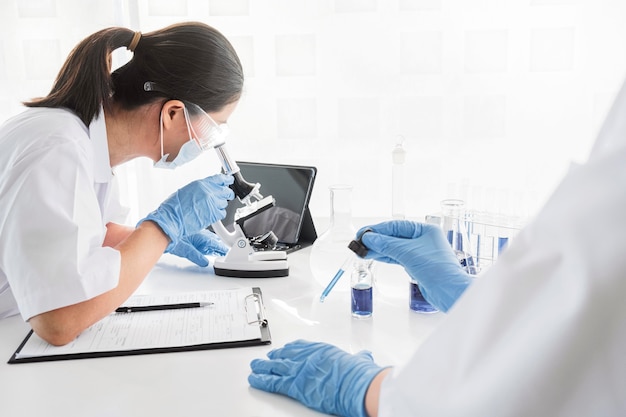 Asian woman working on a chemical project for a new discovery