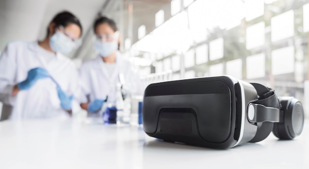 Free photo asian women working on a chemical project for a new discovery