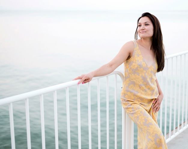 Asian young female model by the sea