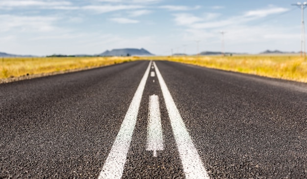 Asphalt road across the countryside