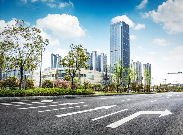 Asphalt road and modern city