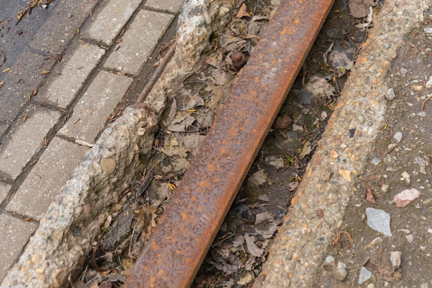 Free photo asphalt street with train rails