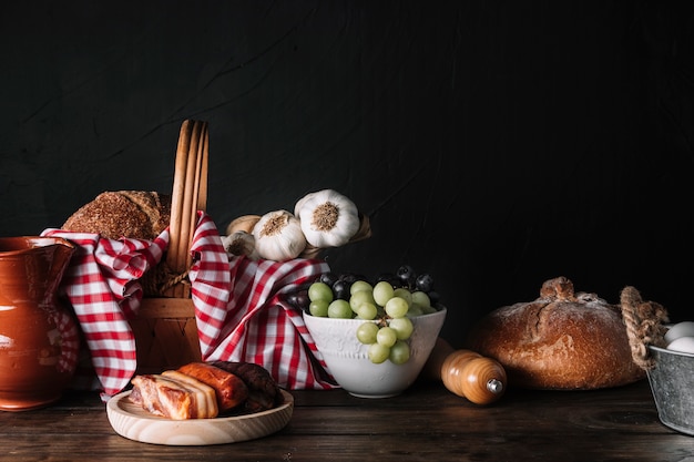 Assorted food and basket on table