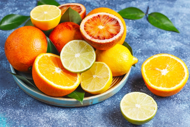 assorted fresh-citrus fruits,lemon,orange,lime,blood orange,fresh and colorful, top view