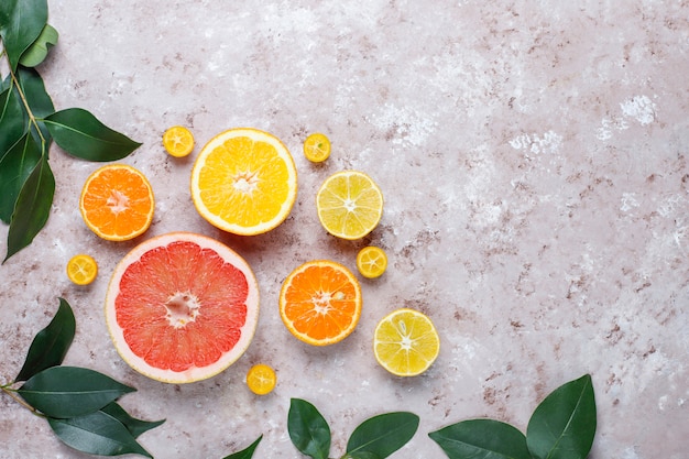 assorted fresh-citrus fruits,lemon,orange,lime,mandarin,kumquat,grapefruit fresh and colorful,top view