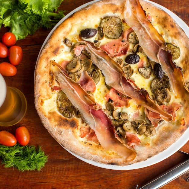 Assorted Meat pizza with jamon and olives