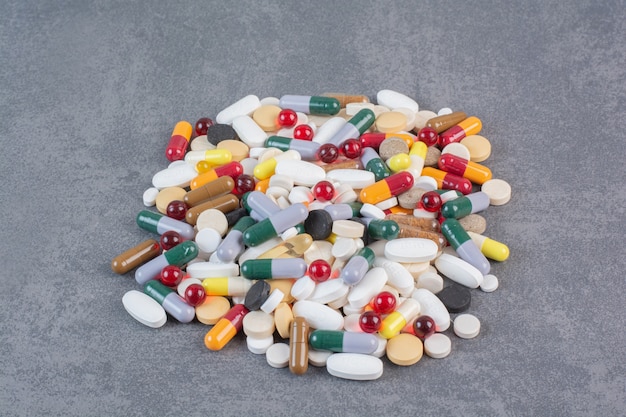 Assorted pharmaceutical medicine pills, tablets and capsules.