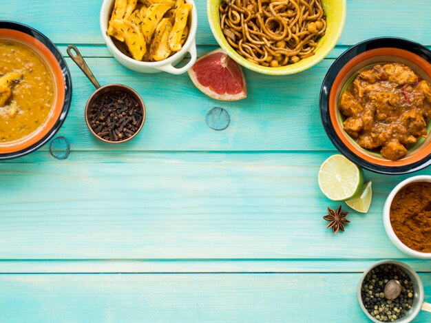 Assorted spices and citruses near dishes