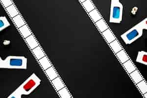 Free photo assortment of cinema elements on black background with copy space