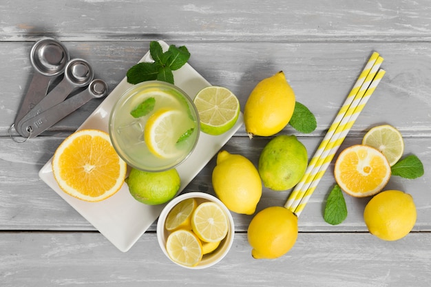 Assortment of citrus with straws