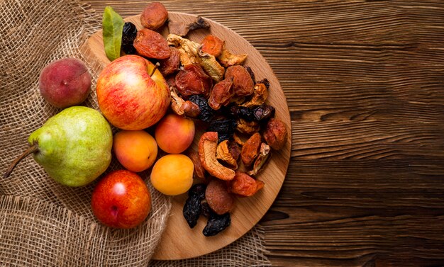 Assortment of fresh autumnal fruits with copy space