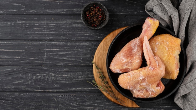 Assortment of frozen chicken on the table