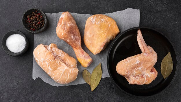 Assortment of frozen chicken on the table