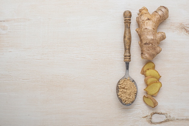 Assortment of ginger on wooden table with copy space