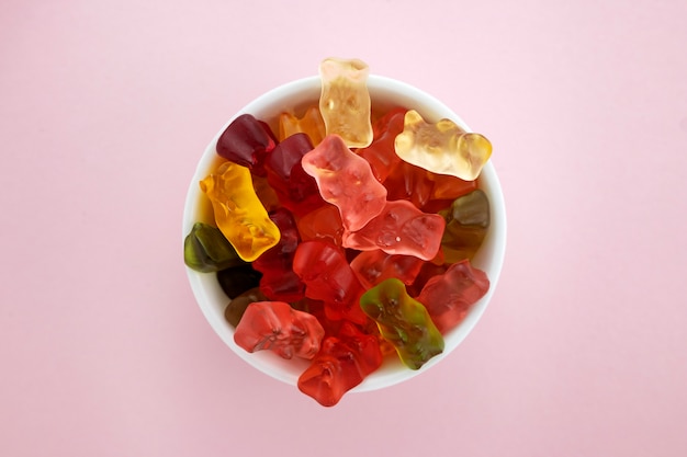 Free photo assortment of gummy bear candy with plastic cup