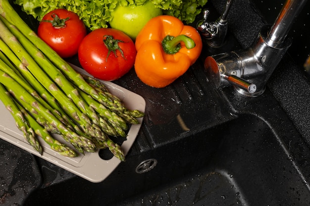 Assortment of healthy food being washed