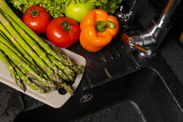 assortment of healthy food being washed