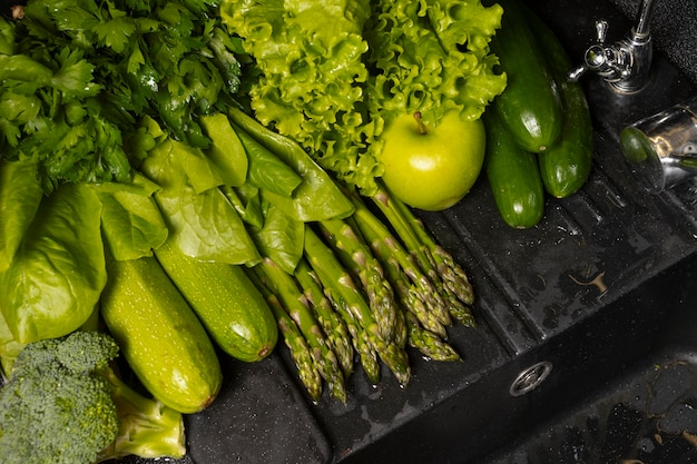 assortment of healthy food being washed
