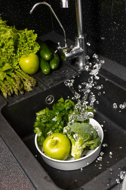 Assortment of healthy food being washed