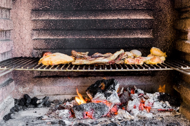 Assortment of meat grilled cooking in barbecue