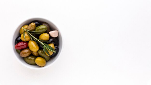 Assortment of olives in bowl with copy space