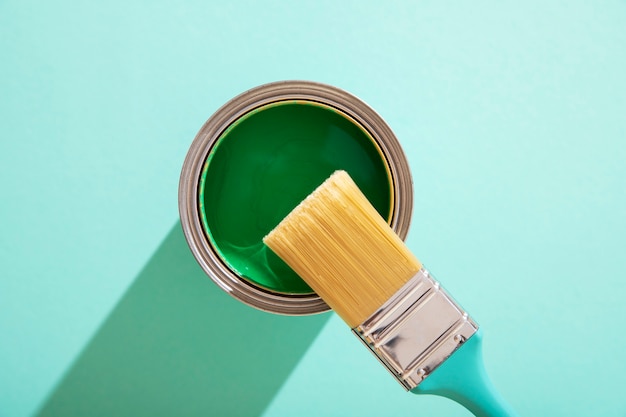 Assortment of painting items with green paint