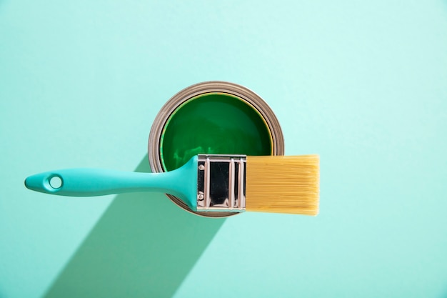 Assortment of painting items with green paint