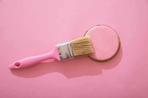 Assortment of painting items with pink paint