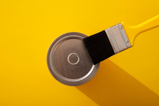 Assortment of painting items with yellow paint