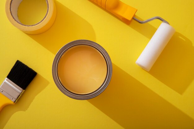 Assortment of painting items with yellow paint