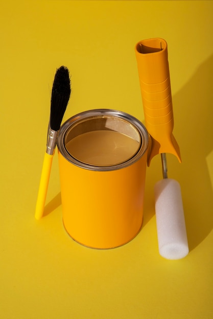 Assortment of painting items with yellow paint