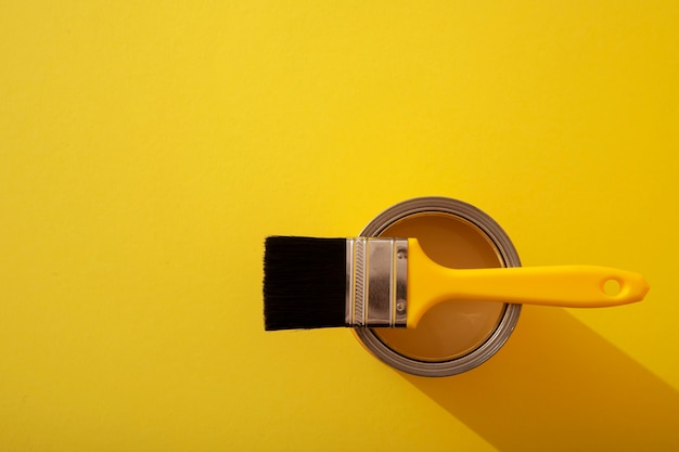 Assortment of painting items with yellow paint