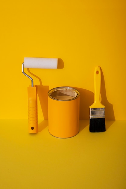 Assortment of painting items with yellow paint