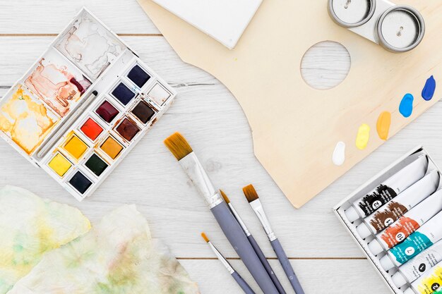 assortment of painting supplies on the table