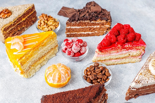 Assortment of pieces of cake. Free Photo
