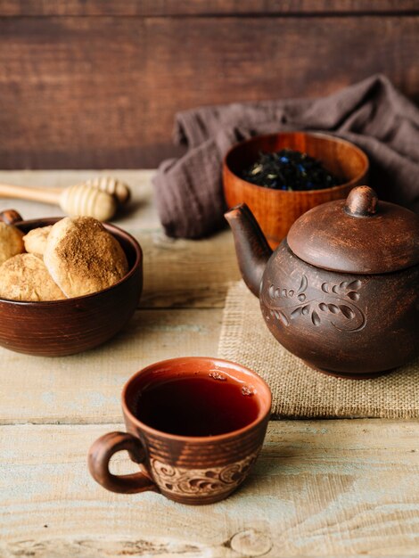 Assortment of rustic set of teapot and cups