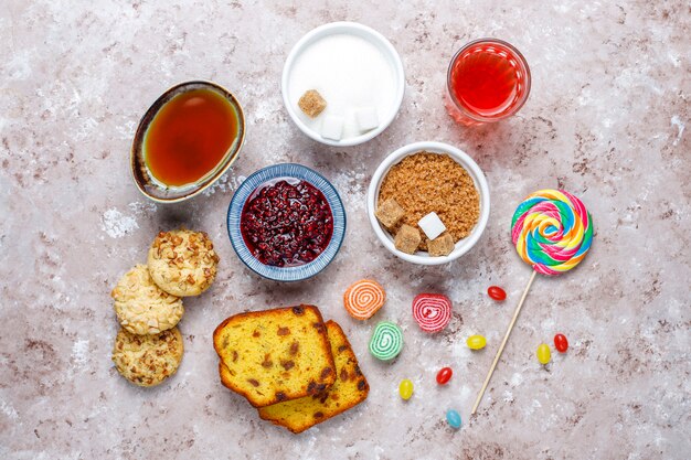 Assortment of simple carbohydrates food on light table