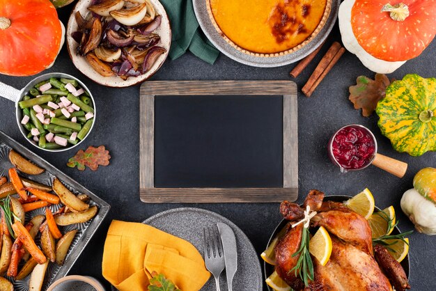 Assortment of thanksgiving day delicious dinner with blackboard