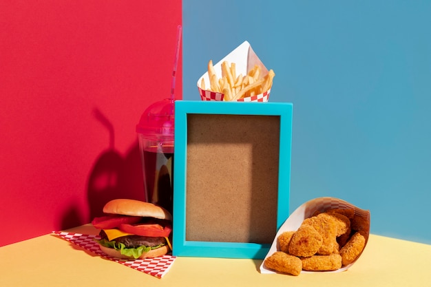 Assortment with blue frame and delicious food