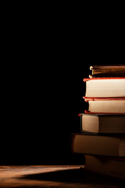 Assortment with books and dark background