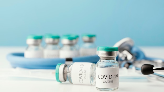 Assortment with coronavirus vaccine bottle