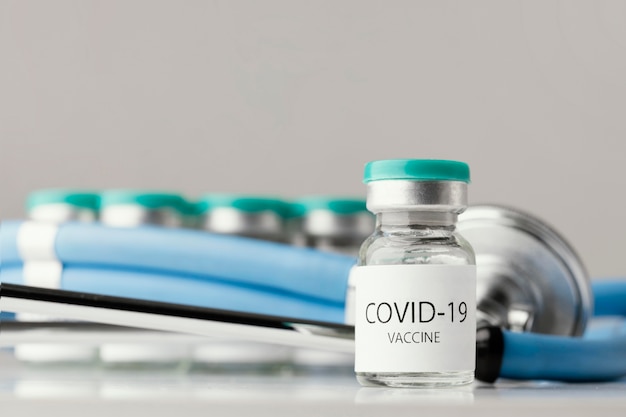 Assortment with coronavirus vaccine bottle