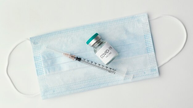 Assortment with coronavirus vaccine bottle