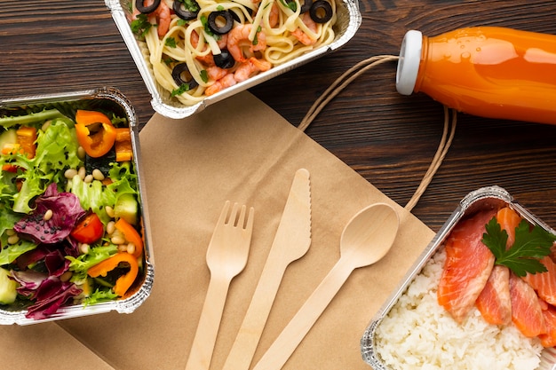 Assortment with different meals on a wooden table