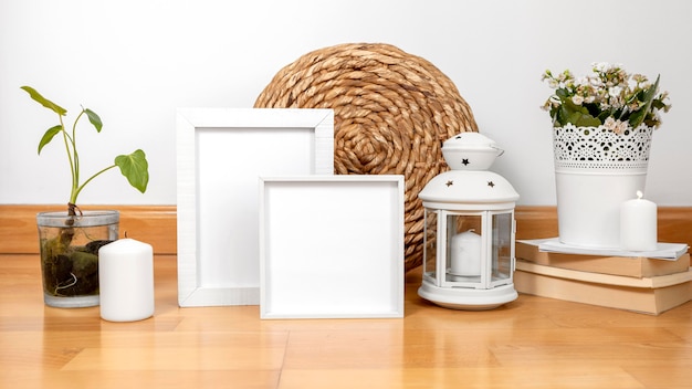 Free photo assortment with empty frames indoors