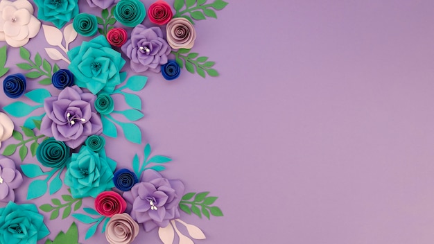 Free photo assortment with floral frame and purple background