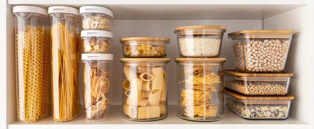 Assortment with food containers on shelf