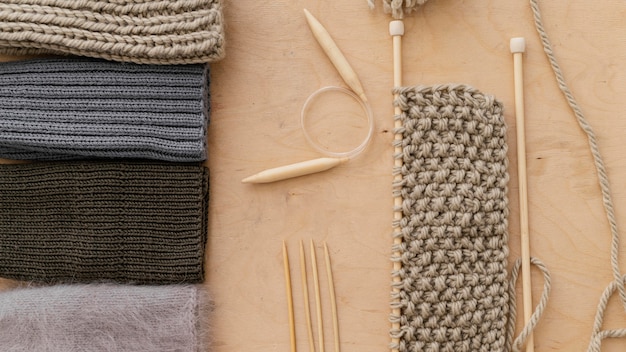 Free photo assortment with knitting tools top view