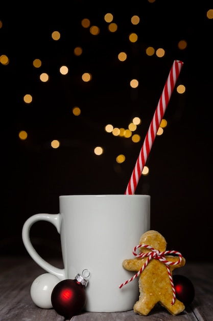 Free photo assortment with mug and gingerbread cookie man