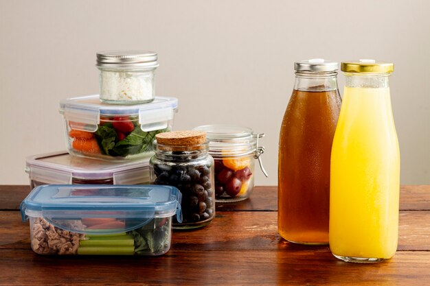 Assortment with packed food and juice bottles